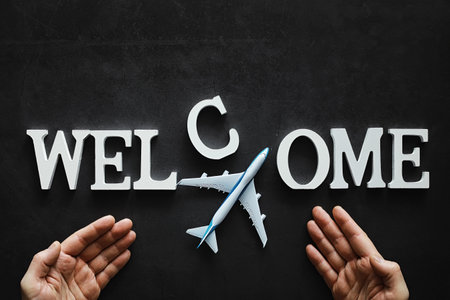 Background concept. The inscription Welcome on a dark background.の写真素材