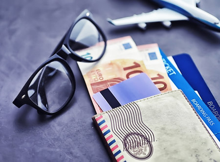 Air ticket and passport for flight by plane. Travel concept Ticket booking.の写真素材