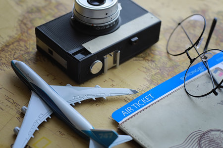 Travel concept. Map on the table and model aircraft.の写真素材