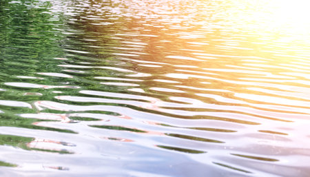 Landscape lake. Texture of water. The lake is at dawn. The mouth of the river at the confluence of lake.の写真素材