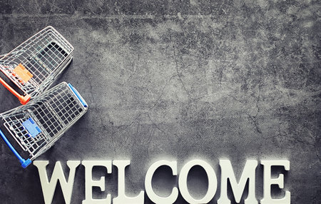 Background concept. The inscription Welcome on a dark background.の写真素材