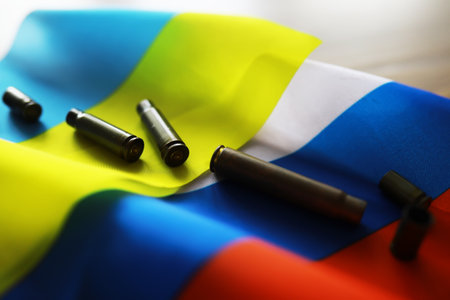 The concept of support in a military conflict. Solidarity. Politics. Flags are on the table.の写真素材