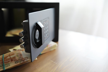 money in a residential safe close-up photo. Deposit in cash. Russian rubles are in safeの写真素材