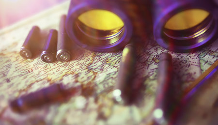 Binoculars and reflection in lenses. Map background.の写真素材