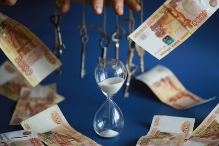 Money and business idea, The dollar bills tied with a rope, with a sign on key fob - Moneyの写真素材