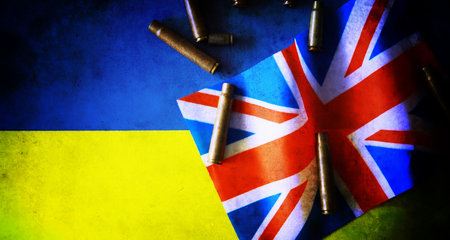 British and Ukrainian flags. Help of Great Britain to Ukraine in the military conflict. Western support for the Kyiv.の写真素材