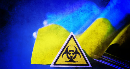 Ukrainian flag biohazard and test tubes. Assistance to Ukraine in biolaboratories. Biological laboratories in Ukraine.の写真素材