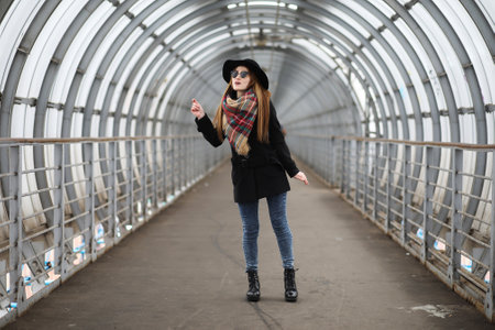 French woman on walk in the central part of the cityの写真素材