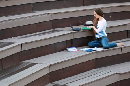 girl student study homework outdoorの写真素材