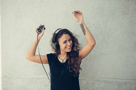 Happy girl listening to musicの写真素材