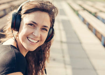 beautiful girl listening to musicの写真素材