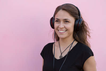 Joyful girl listening to musicの写真素材