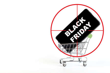 White letters BLACK FRIDAY in a shopping trolley in a round sight, isolate on white.の写真素材