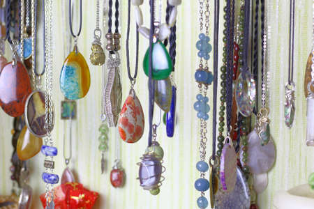 Handmade jewelry made of natural stones. Pendants and pendants made of natural material.の写真素材