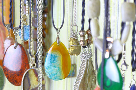 Handmade jewelry made of natural stones. Pendants and pendants made of natural material.の写真素材