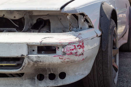 Fragment of the wrecked car, engine, gearbox and hinged equipment, car after the accident.の写真素材