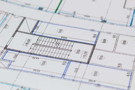 The background is from a fragment of a typical drawing of a house under construction.の写真素材
