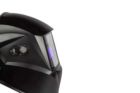 Black mask to perform welding work on a white background, view from the side.の写真素材