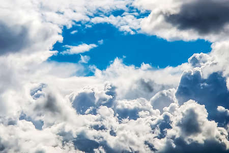 White mountains of clouds on blue sky, Natural natural background.の写真素材