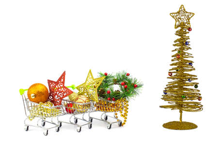 Christmas decorations and toys in baskets of hypermaquette, discounts and sales, preparation for the holiday.の写真素材