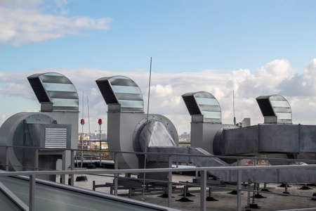 Loudspeaker of the emergency warning system against the background of a blue sky.の写真素材