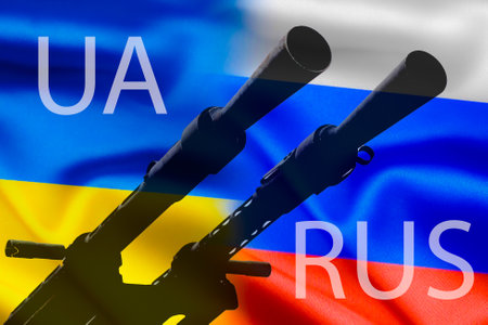 Military conflict between Russia and Ukraine, A gun against the background of two state flags of the warring states.の写真素材