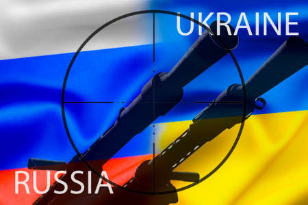 The national flag of Russia and Ukraine against the background of the sight, military conflict.の写真素材