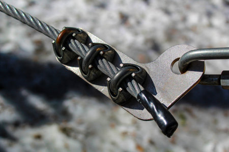 Fastening elements of the cable made of galvanized steel, couches, clamps. Fastening system for the rope park.の写真素材