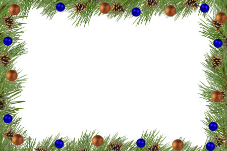 Christmas frame with fir branches and blue ornaments on white backgroundの写真素材
