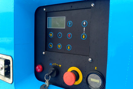 Hydraulic lift control panel, control buttons, power and emergency stop.の写真素材