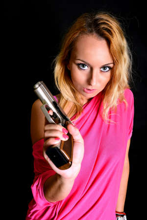 woman with gunの写真素材