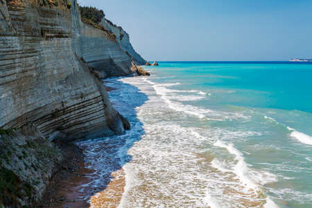 View of sea waves lapping on the rocks. Corfu. Greece.の写真素材