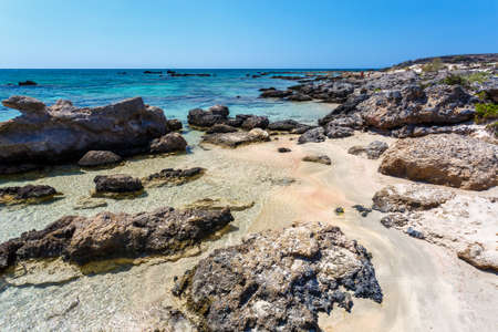 View of people having a rest on the beach of Elafonissi. Crete. Greece.の写真素材