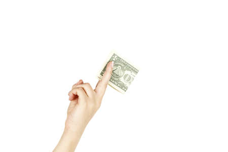 Isolated female's hand holds one dollar on white background.の写真素材