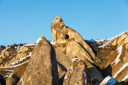 Winter view of the caves of Cappadocia at sunset. Turkey.の写真素材
