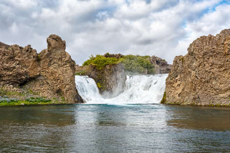 View of Hjalparfoss waterfall of Iceland.の写真素材
