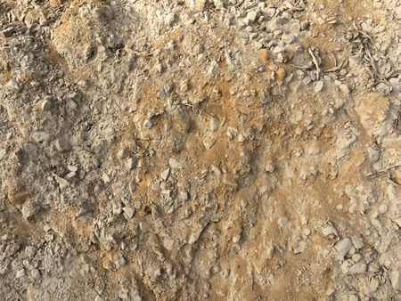 Stones as a background, scattering of stones as a background, textured soil, stone crumbの写真素材