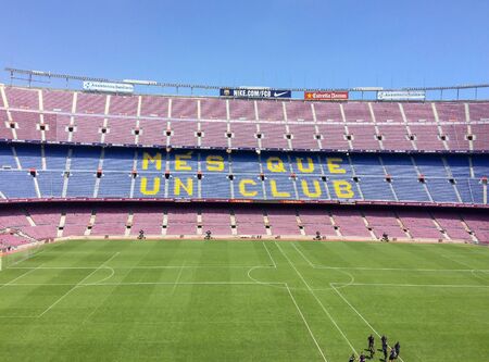 Spain, Catalonia, Bercelona 17/06/2017 Stadium Camp Nou, training players, training in an empty stadium, empty stadium bleachers, players training, football field on a sunny dayのeditorial素材