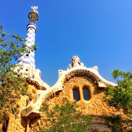 gingerbread house with a tower, against a clear blue sky backgroundのeditorial素材