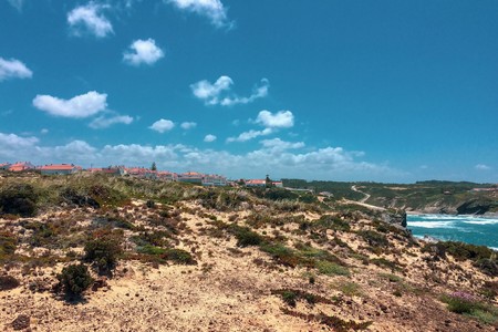 small town by the sea, many small clouds, deserted place, tourist placeの写真素材