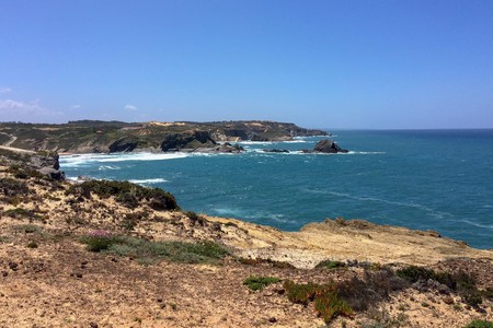 seascape, sea view, rocks and waves of the Atlantic Ocean, top view of the sea, warm sunny dayの写真素材