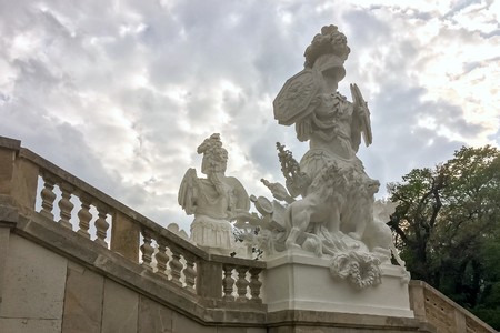 sculpture against the cloudy sky background, sky before a thunderstorm, antique sculptures in the gardenのeditorial素材