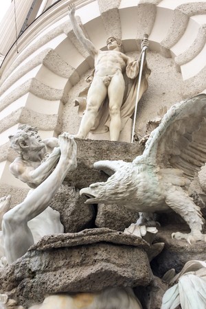 sculptural composition, dynamic scene with the participation of three men, sculptural composition, stone birdのeditorial素材