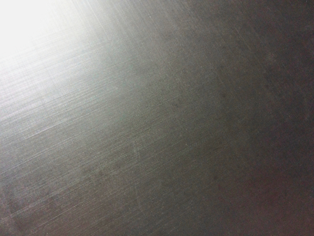 metal surface, aluminum alloy, magnesium alloy, sun flare, grainy textureの写真素材
