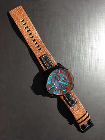 watch on a dark background, dial, clock hands, wrist watchesの写真素材