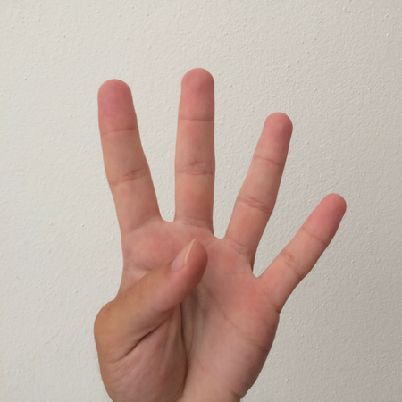 white man's palm, outstretched palm, hand on a white background, part of the body, part of the hand, white skin, four fingers, show the amountの写真素材