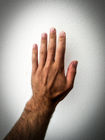 white man's hand on a white backgroundの写真素材