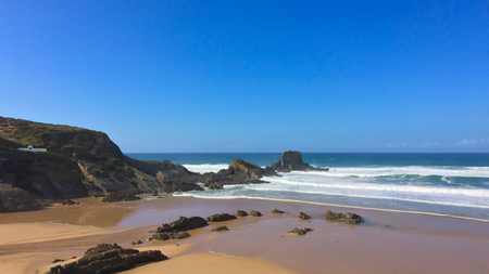 beautiful seascape, rocks near the sea, waves and surfの写真素材