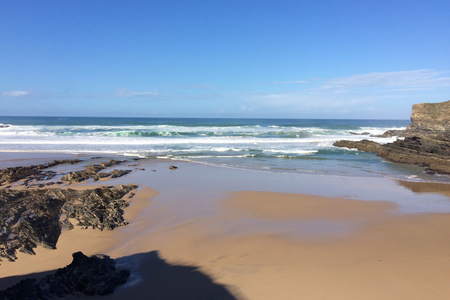 beautiful seascape, rocks near the sea, waves and surfの写真素材