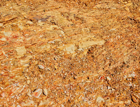 a lot of small multi-colored stones as a background, variegated stonesの写真素材